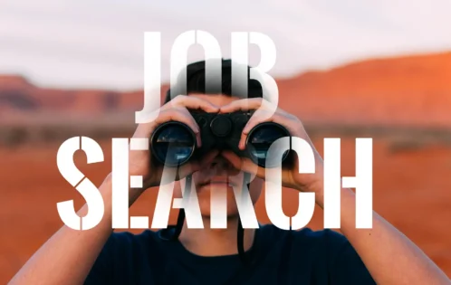 Person using binoculars to search for job opportunities and employment openings